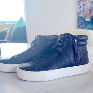 Ugg zip up ankle shoes. Black leather great condition. Worn once or twice only.